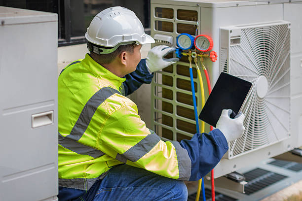 Professional Heat Pump Repair technician working in Fallbrook, CA